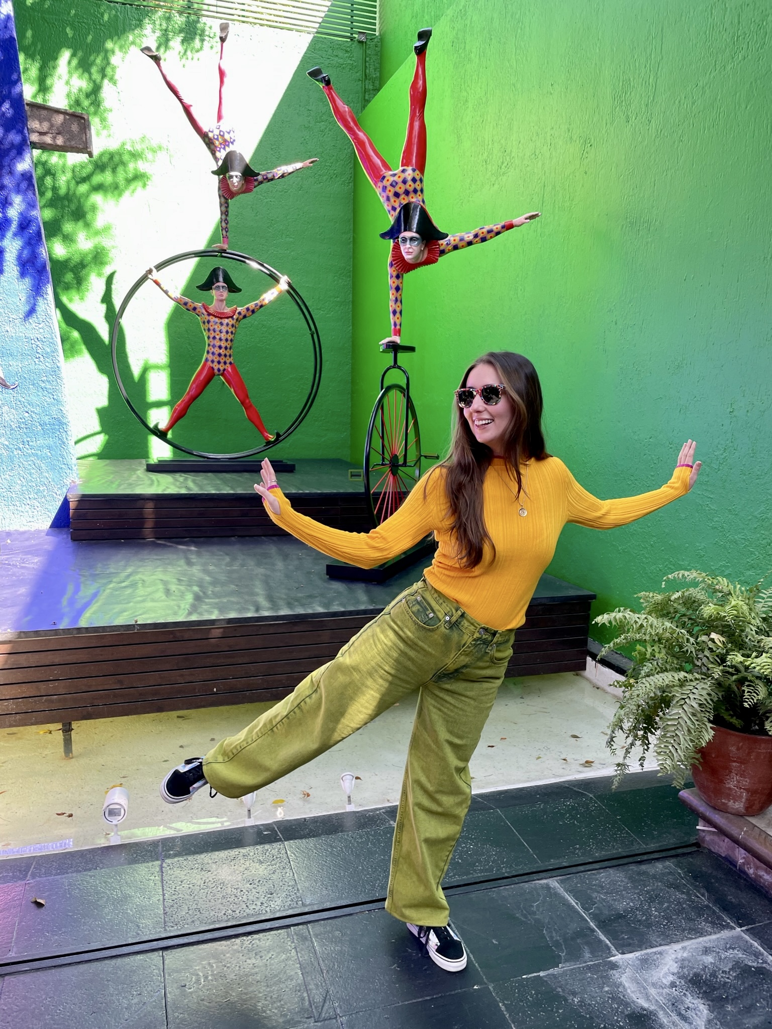 Susie in a vivid Mexican craft setting